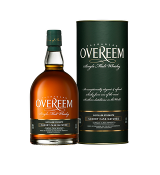 A bottle of Overeem Sherry Cask Matured – Distiller’s Strength Tasmanian Single Malt Whisky stands beside its green cylindrical box, both with gold and white text, offering enticing notes of dark chocolate and caramel.