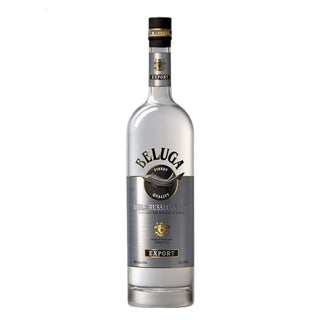 A tall, clear 1.5L bottle of Beluga Noble Russian Vodka with a silver label, gold accents, and black cap—celebrated for smooth, creamy texture and subtle grain sweetness—displayed against a white background.