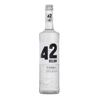 42 Below Vodka 700ml comes in a clear glass bottle with a white label featuring bold black "42" and "Below" underneath, sealed with a silver cap. It promises smooth texture and grain sweetness, all showcased on a pristine white background.