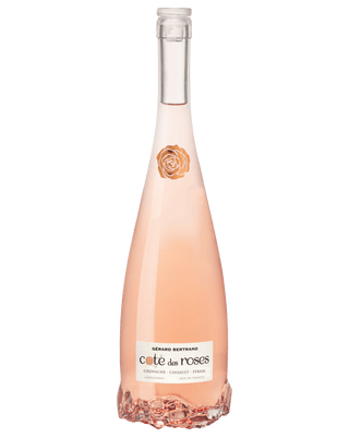 Bottle of Gérard Bertrand Cote des Roses Rosé from Languedoc with elegant label and rose-shaped glass base.
