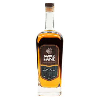 A bottle of Amber Lane Noble Lane Australian Single Malt Whisky with a wooden cork, dark label, and rich amber liquid. Notes of honey and vanilla complement the label: "Amber Lane Noble Lane Australian Single Malt Whisky.