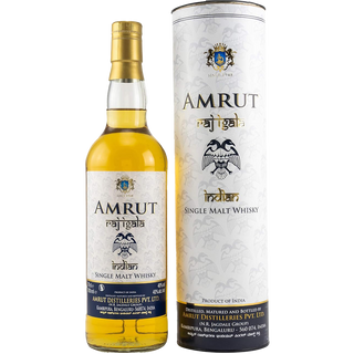 A bottle of Amrut Raj Igala Indian Single Malt Whisky with gold, blue, and white labels stands by its matching cylindrical box. The crest, eagle motif, and detailed product info accompany creamy peach notes.