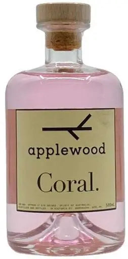 Bottle of Applewood Coral liquor with a cork lid on a white background