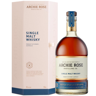 A bottle of Archie Rose Australian Single Malt Whisky with a blue cap stands beside its cream and blue box, both branded and labeled. The amber whisky offers notes of sun-dried apricots and honeycomb.