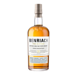 A bottle of Benriach The Sixteen Single Malt Scotch Whisky, with light amber liquid, a white label accented in blue and gold, gray cap, embossed branding near the neck, and notes of honeyed malt.