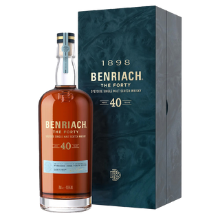 A bottle of Benriach The Forty Single Malt Scotch Whisky stands beside its matching dark green box, both marked with gold and white text showcasing it as a 40-year-old whisky crafted in Speyside since 1898.