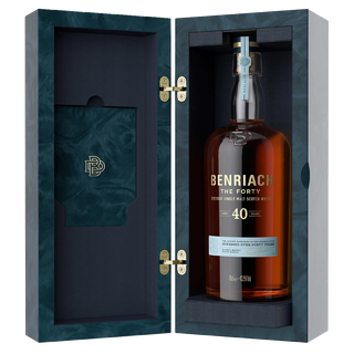 A large bottle of Benriach The Forty Single Malt Scotch Whisky is displayed upright in an open, elegant blue box with gold hinges and a padded interior, showing hints of walnut on the label.