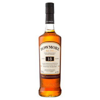 A bottle of Bowmore 18 Year Old Single Malt Scotch Whisky, featuring a black cap, amber liquid, and cream label with brand and age—renowned for its rich peat smoke flavor and sherry sweetness.