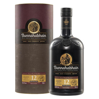 Bunnahabhain 12 Year Old Single Malt Scotch Whisky bottle next to its cylindrical cardboard packaging box, on a solid white background.