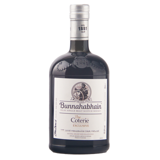 A bottle of Bunnahabhain The Coterie Exclusive single malt scotch whisky on a plain white background.