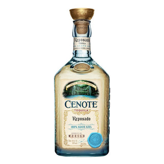 A clear 700ml glass bottle of Cenote Reposado Tequila with a gold cap, blue label, and embossing; “100% Agave Azul” and “Product of Mexico” highlighted. Vanilla tequila with agave caramel and oak spice notes.