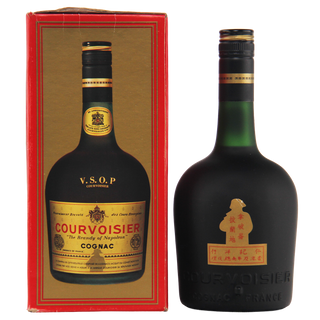 Courvoisier cognac bottle with red box on a white background