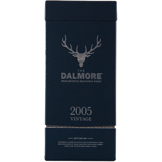 A navy blue box of The Dalmore 18 Year Old 2005 Vintage Single Malt Whisky, with a silver stag logo and text stating 2005 Vintage Bottled 2022. Features spiced fruitcake notes for an elegant presentation.