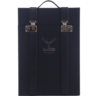 A black rectangular carrying case with two vertical straps, silver buckles, and a top handle. Embossed on the front is a stag’s head and "The Dalmore"—ideal for carrying The Dalmore 40 Year Old Single Malt Scotch Whisky in style.