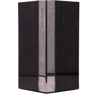 A luxurious dark wooden box with vertical metallic accents holds The Dalmore 40 Year Old Single Malt Scotch Whisky (700ml, 42% ABV), offering notes of maple syrup and rich Colombian coffee. "Dalmore Aged 40 Years" is engraved on the metal.