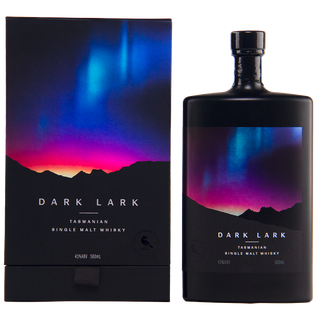 A bottle and box of Dark Lark 2024 Single Malt Whisky, both with a colorful aurora over dark mountains and white text detailing product info and tasting notes of oak spice and blackcurrant crumble.