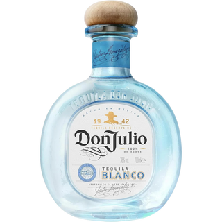 A blue round bottle of Don Julio Blanco Tequila