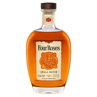 A bottle of Four Roses Small Batch Kentucky Straight Bourbon Whiskey with amber liquid, a wooden cap, and a cream label showing four orange roses, known for notes of vanilla and baking spices.