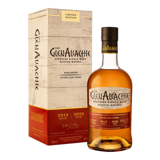 A bottle of GlenAllachie 9 Year Old Cuvée Wine Cask Single Malt Scotch Whisky stands beside its matching box, featuring a cream and red design. The whisky offers notes of ripe red berries and oak spice. Distilled in 2012, bottled in 2022.