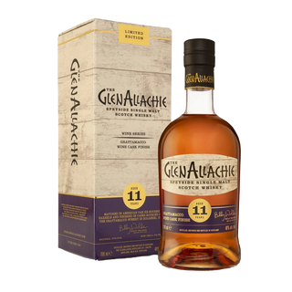 A bottle of GlenAllachie 11 Year Old Grattamacco Cask Finish Single Malt Scotch Whisky stands beside its box, both labeled as limited edition, offering notes of dark chocolate and caramel.