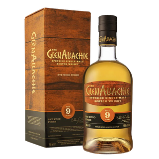 A bottle of GlenAllachie 9 Year Old Rye Cask Finish Single Malt Scotch Whisky stands by its matching box, both with gold and orange labels evoking hints of candied orange and honeyed spices.