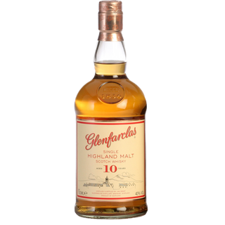 A bottle of Glenfarclas 10 Year Old Single Malt Scotch Whisky features a beige label with red and gold accents, copper-colored cap, and displays its age, distillery name, and notes of sherry-sweet malt.