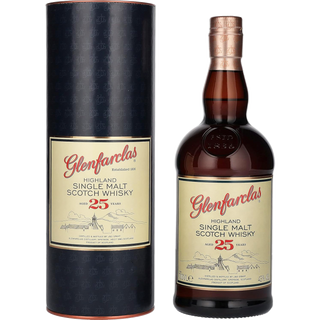 A bottle of Glenfarclas 25 Year Old Single Malt Scotch Whisky stands beside its cylindrical box, both adorned with cream labels bearing red and black text plus a subtle distillery and hill motif, evoking elegant hints of dried fruits.
