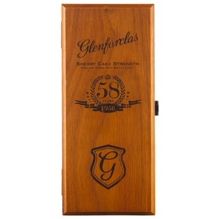 Wooden Glenfarclas whisky box with branding and age details on a white background
