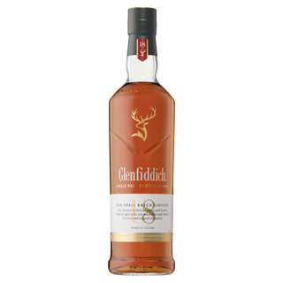 A bottle of Glenfiddich 18 Year Old Single Malt Scotch Whisky, featuring a stag logo and gold, red, and white label on a white background—renowned for its rich oak notes and subtle dried fruit hints.