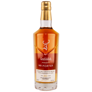 Glenfiddich Mr. Porter 20 Year Old Single Malt Scotch Whisky comes in a bottle with a gold cap and brown-and-white label, displaying amber liquid with floral aromas and creamy caramel hints.