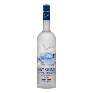 Grey Goose Vodka 1L features a frosted bottle with a flying goose, blue mountains, and the Grey Goose logo in blue and silver. Enjoy its smooth, creamy texture and gentle sweetness in every sip.