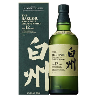 A green bottle of Hakushu 12 Year Old Single Malt Japanese Whisky (700ml, 43% ABV) stands beside its matching dark green box, both showing Japanese and English text. This herbal whisky offers a distinctive Japanese flavor experience.