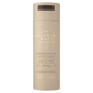 A beige cylindrical cardboard container with white and gold text for Hellyers Road 12 Year Old American Oak Single Malt Tasmanian Whisky, featuring vanilla and sweet oak notes.