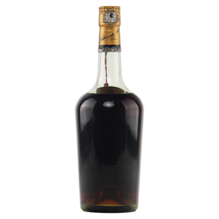 Dark liquid bottle with a gold label on a white background