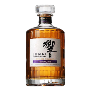 A bottle of Hibiki Japanese Harmony Master’s Select Blended Japanese Whisky features a clear, faceted glass design, amber liquid, a silver label with Japanese and English text, and offers floral aromas with subtle honey notes.