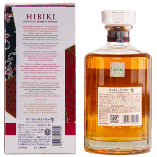 A bottle of Suntory Hibiki Blended Japanese Whisky shown from the back and side, with the amber liquid visible through the clear glass and printed labels on both the front and back.