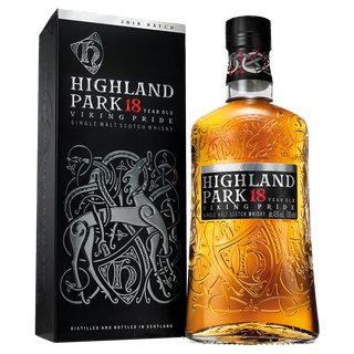 A bottle of Highland Park 18 Year Old Single Malt Scotch Whisky stands next to its decorative black and silver box, featuring Norse-inspired artwork and branding, known for a smoky finish with notes of dark chocolate.