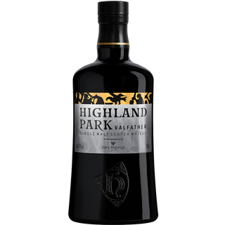 A bottle of Highland Park Valfather Single Malt Scotch Whisky, with a black cap and a gold-and-silver Viking-inspired label, offers bold text and flavors of green apple and peat smoke.