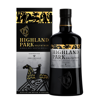 A bottle of Highland Park Valfather Single Malt Scotch Whisky stands before its matching box, both adorned with Norse-inspired black, gold, and silver designs featuring horse and Viking motifs—evoking hints of peat smoke and green apple.