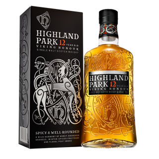 A bottle of Highland Park 12 Year Old Viking Honour Single Malt Scotch Whisky sits by its Norse-inspired box with silver accents. The sherry cask whisky is described as spicy, well-rounded, and nuanced on the label.