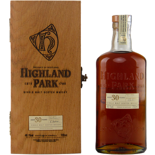 Highland Park 30-year-old single malt Scotch whisky bottle and wooden box on a white background