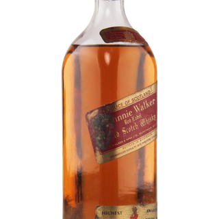 Bottle of Johnnie Walker Red Label whisky on a white background