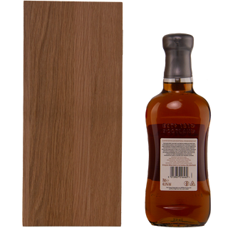 Whiskey bottle with wooden box on a white background
