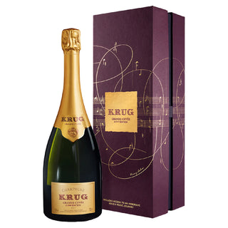 Krug champagne bottle with packaging on a white background