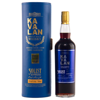 A bottle of Kavalan Solist Vinho Barrique Cask Cask W120120118A Single Malt Whisky sits by its blue case with gold and white lettering, its dark amber liquid offering toasted oak aromas and a wine-kissed sweetness.