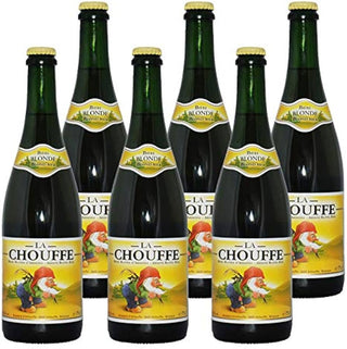 Pack of La Chouffe beer bottles with visible branding and labels.