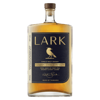 A bottle of Lark Cask Strength Tasmanian Single Malt Whisky with a dark blue and gold label featuring a bird illustration, made in Tasmania, and offering notes of golden syrup with hints of dark chocolate.