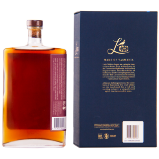 A rectangular glass bottle of Lark Muscat Cask Finish II Single Malt Whisky, filled with amber liquid, stands beside a dark blue box with gold text. The bottle features a short neck, round cap, side label, and spiced citrus notes.