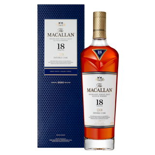 A bottle of The Macallan Double Cask 18 Year Old Single Malt Scotch Whisky stands beside its blue textured box, promising notes of toasted wood spice and vanilla toffee.