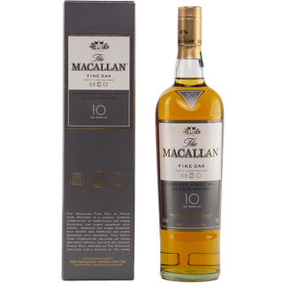 A bottle of The Macallan 10 Year Old Fine Oak Single Malt Scotch Whisky stands beside its matching dark grey box, both with gold and white labels that reflect the honey and creamy malt flavors inside.